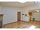 Spacious living room with stone fireplace and wood floors adds character at 8600 E Alameda Ave # 17-203, Denver, CO 80247