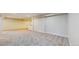 Large finished basement with neutral carpet and paint provides a versatile living space at 1229 Berganot Trl, Castle Pines, CO 80108