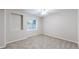 Basement bedroom with carpeted floor, window, and ceiling fan at 1229 Berganot Trl, Castle Pines, CO 80108