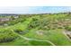 Scenic aerial shot of the golf course community at 1229 Berganot Trl, Castle Pines, CO 80108