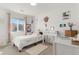 Cozy bedroom with a single bed, and decorated with sports themed wall art at 11885 Helena St, Commerce City, CO 80022