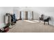 Large bonus room featuring high ceilings, carpet, and furniture at 11885 Helena St, Commerce City, CO 80022