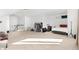Open bonus room with carpet, high ceilings, a bed, and clothing racks at 11885 Helena St, Commerce City, CO 80022