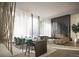 Relaxing communal area featuring a grand fireplace, large dining table, modern seating, and bright windows at 525 18Th St # 1201, Denver, CO 80202