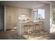 Well-lit kitchen featuring stylish cabinetry, stainless steel appliances, a waterfall island, and counter seating at 525 18Th St # 1201, Denver, CO 80202