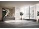 Modern designed lobby with marble accents, sleek reception desk, art installations, and comfortable seating at 525 18Th St # 1201, Denver, CO 80202