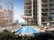 Rooftop swimming pool with lounge chairs providing relaxation and scenic views of the cityscape at 525 18Th St # 1201, Denver, CO 80202