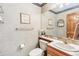 Cozy bathroom with a toilet, sink, and decorative elements, creating a comfortable and inviting space at 942 Xenon Ct, Golden, CO 80401