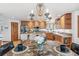 Beautiful kitchen features granite countertops, a large island, stainless steel appliances, and hardwood floors at 942 Xenon Ct, Golden, CO 80401