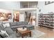 Open floor plan from the living room to the kitchen, dining, and staircase at 6588 S Sheridan Loop, Littleton, CO 80123