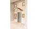 Charming playroom with a miniature house-themed play area featuring a small door and windows at 6588 S Sheridan Loop, Littleton, CO 80123