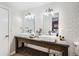 Bathroom featuring a double vanity with vessel sinks, subway tile, and modern lighting at 7074 Yates St, Westminster, CO 80030