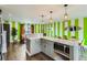 Bright kitchen featuring granite countertops, stainless steel appliances, and an open floor plan at 7074 Yates St, Westminster, CO 80030