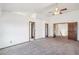 Bedroom offers high ceilings, neutral paint, newer carpet, and two closets at 2043 E Nichols Dr, Centennial, CO 80122