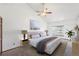 Serene main bedroom with vaulted ceiling, ceiling fan, and a cozy rug at 2043 E Nichols Dr, Centennial, CO 80122