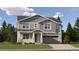 Charming two-story home featuring stone accents, a covered porch, and an attached two-car garage at 2162 S Gold Bug Way, Aurora, CO 80018