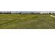Rolling hills of a lush green golf course on a sunny day at 2162 S Gold Bug Way, Aurora, CO 80018