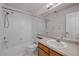 Bathroom with tub and shower combination and vanity at 19663 E Mann Creek Dr # D, Parker, CO 80134