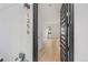 Modern front door showcasing a view of the home's light, bright interior at 1256 Yates St, Denver, CO 80204