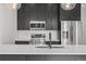 Modern kitchen design with stainless steel appliances and plenty of counter space at 1256 Yates St, Denver, CO 80204