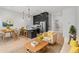 Elegant living space featuring a modern kitchen, dining area, and a cozy living room at 1256 Yates St, Denver, CO 80204