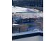 A train with advertising is viewed from the rooftop patio at 1256 Yates St, Denver, CO 80204