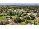 Breathtaking aerial view of the property showcasing its expansive landscaping and neighborhood views at 7750 W 5Th Ave, Lakewood, CO 80226