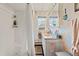 Well-lit bathroom with a shower and tub combination and neutral finishes at 7750 W 5Th Ave, Lakewood, CO 80226
