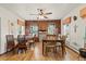 Classic dining room with wood paneling, hardwood floors, and natural light, creating an elegant space for meals at 7750 W 5Th Ave, Lakewood, CO 80226