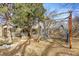 Backyard of home featuring baseball practice net with wooden beam construction at 3241 S Krameria St, Denver, CO 80222