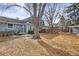 View of a spacious backyard with deck and patio perfect for outdoor living at 3241 S Krameria St, Denver, CO 80222