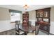 Dining room with wood furniture, neutral walls, and a carpeted floor at 3241 S Krameria St, Denver, CO 80222