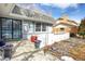 Inviting front entrance with a secure glass storm door at 3241 S Krameria St, Denver, CO 80222