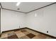 Bright carpeted room with geometric patterns and natural light from windows, great for an office at 3241 S Krameria St, Denver, CO 80222