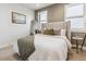 Serene bedroom with a neutral color palette and natural light at 5423 S Prince St # B, Littleton, CO 80120