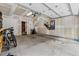Spacious garage with high ceilings, ample storage, and room for multiple vehicles at 5423 S Prince St # B, Littleton, CO 80120