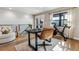 Bright office area with exercise bike, desk and staircase at 5423 S Prince St # B, Littleton, CO 80120