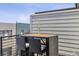 Charming rooftop patio with bar-height seating at 5423 S Prince St # B, Littleton, CO 80120