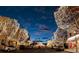 Festive street view at night, adorned with lights, showcasing a vibrant and lively neighborhood at 5423 S Prince St # B, Littleton, CO 80120