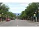 Tree-lined street with mountain views, offering a picturesque setting in a desirable neighborhood at 5423 S Prince St # B, Littleton, CO 80120