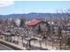 Scenic view of a train station with mountain backdrop, blending urban convenience with natural beauty at 5423 S Prince St # B, Littleton, CO 80120