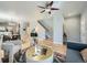 Bright living room featuring hardwood floors, modern furniture, a stairway and big windows at 4509 Perry St, Denver, CO 80212