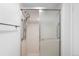 Cozy shower featuring tile walls and floor and a sliding glass door at 14300 E Marina Dr # 306, Aurora, CO 80014