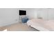 Comfortable bedroom featuring neutral carpet, a double bed, and comfortable furniture at 14300 E Marina Dr # 306, Aurora, CO 80014