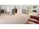 Open living space with comfortable seating and connection to the kitchen at 14300 E Marina Dr # 306, Aurora, CO 80014