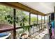 Bright sunroom with large windows and a relaxing atmosphere, perfect for enjoying nature indoors at 14300 E Marina Dr # 306, Aurora, CO 80014