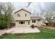 Backyard featuring a concrete patio, green grass, and a wood fence at 4820 W 125Th Ave, Broomfield, CO 80020