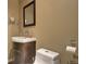 Small bathroom featuring a modern vessel sink, toilet, and framed mirror at 4820 W 125Th Ave, Broomfield, CO 80020