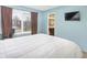 Comfortable bedroom with a large window and an ensuite bathroom at 4820 W 125Th Ave, Broomfield, CO 80020