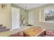 Inviting entryway with light wood floors, a storage shelf, and natural light at 4820 W 125Th Ave, Broomfield, CO 80020